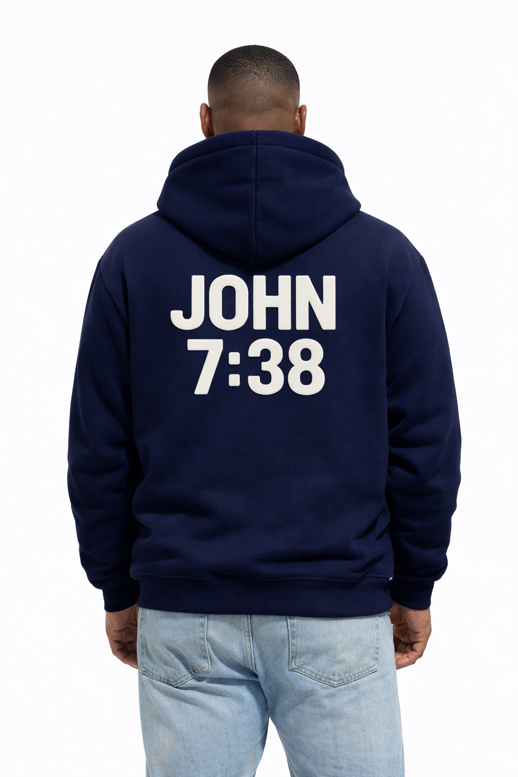 Person wearing a navy hoodie with 'JOHN 7:38' printed on the back, standing against a white background.