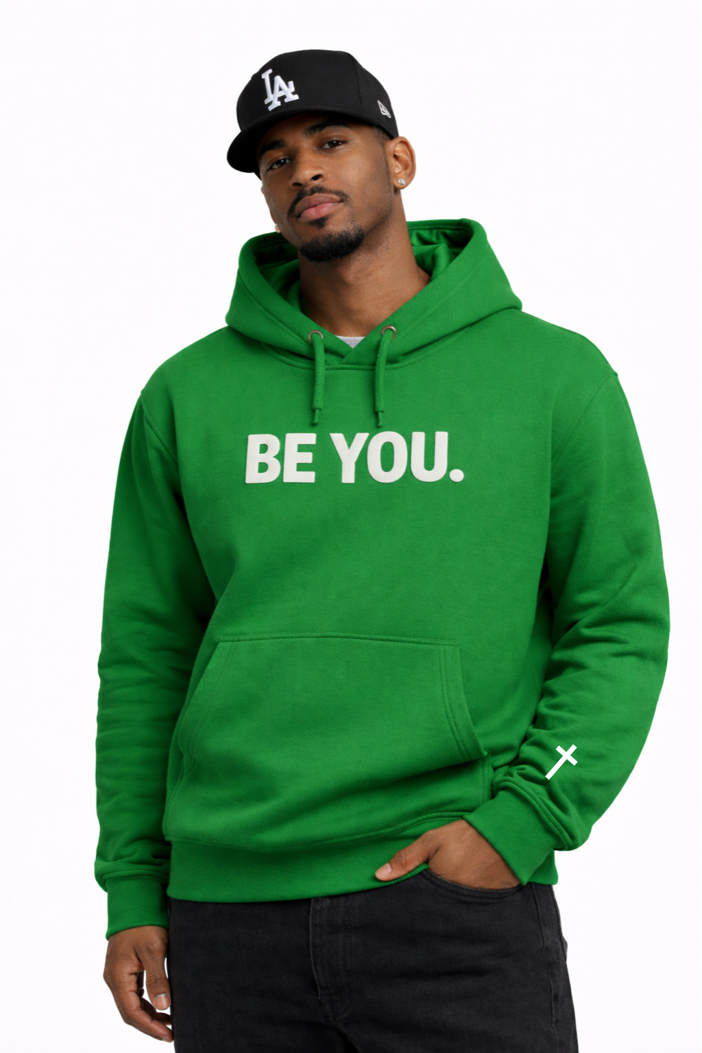 Man wearing a green hoodie with 'BE YOU.' text on a white background