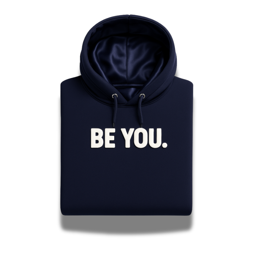 Navy blue satin-lined “BE YOU” Christian hoodie from Savior Brand, folded front display with bold white lettering.